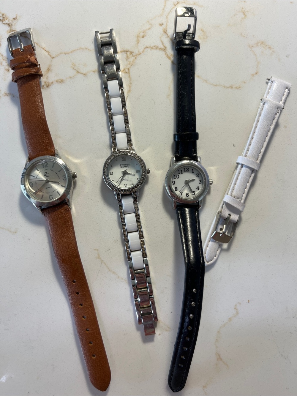 Lot of 4 Women’s Watches - Brown, Silver/White, Black, White Strap